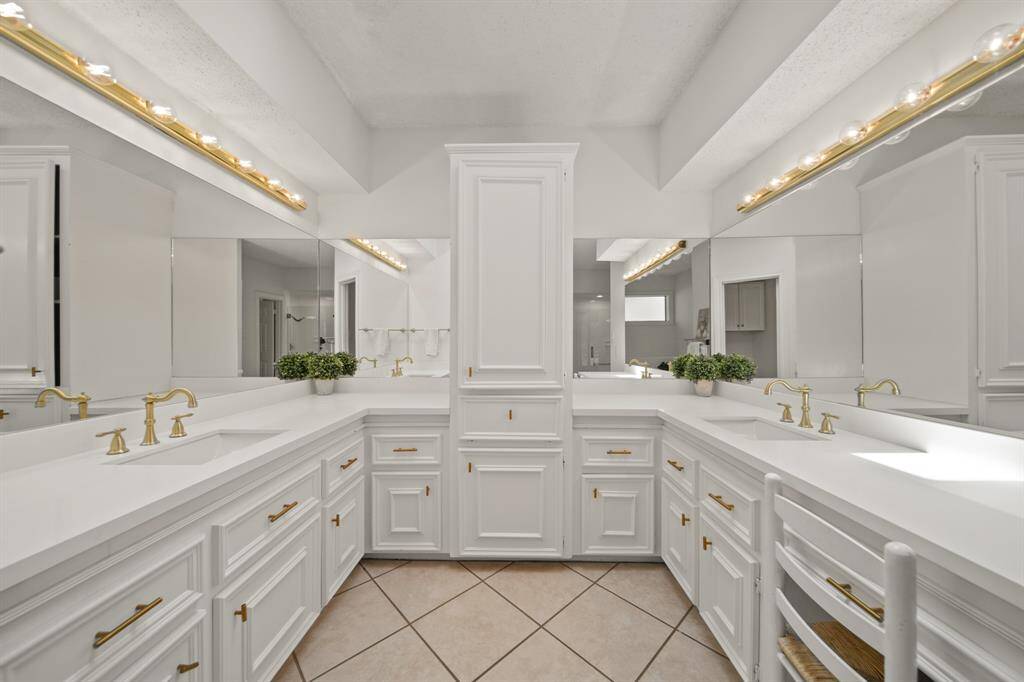 Updated primary bathroom is functional and gorgeous!