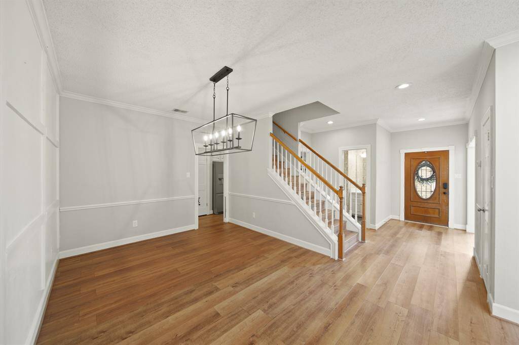 Dining room is accessible from kitchen and foyer.