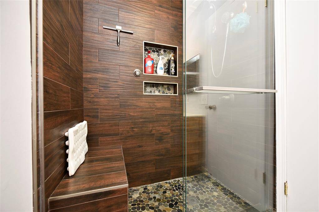 The updated shower in the primary bathroom.