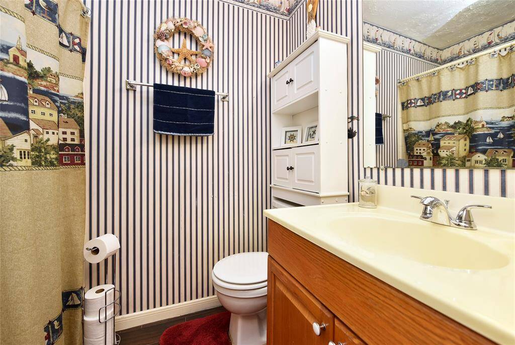 The hall bath has a tub/shower combo.