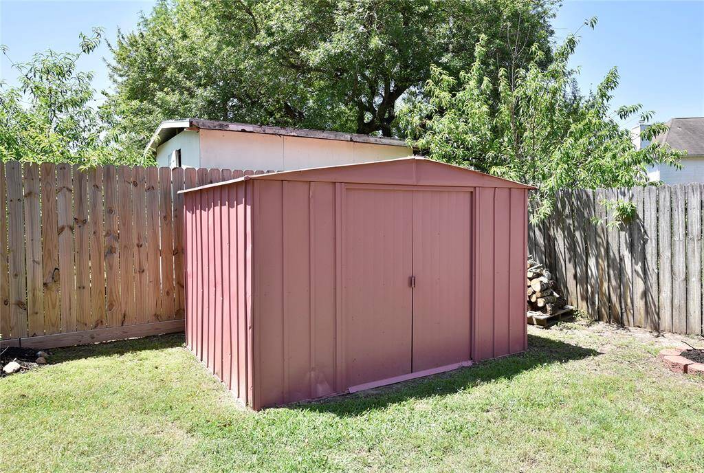 The storage shed saves garage space.