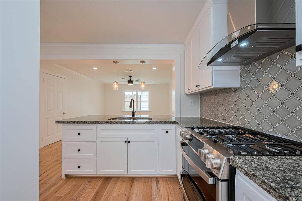 Kitchen includes Granite counter 38" cabinets and New S/S range hood vent
