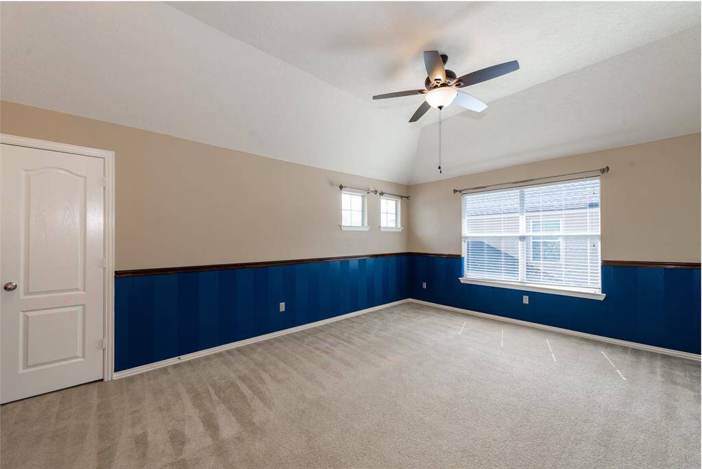 Transform this spacious media room into your ultimate game night haven.
