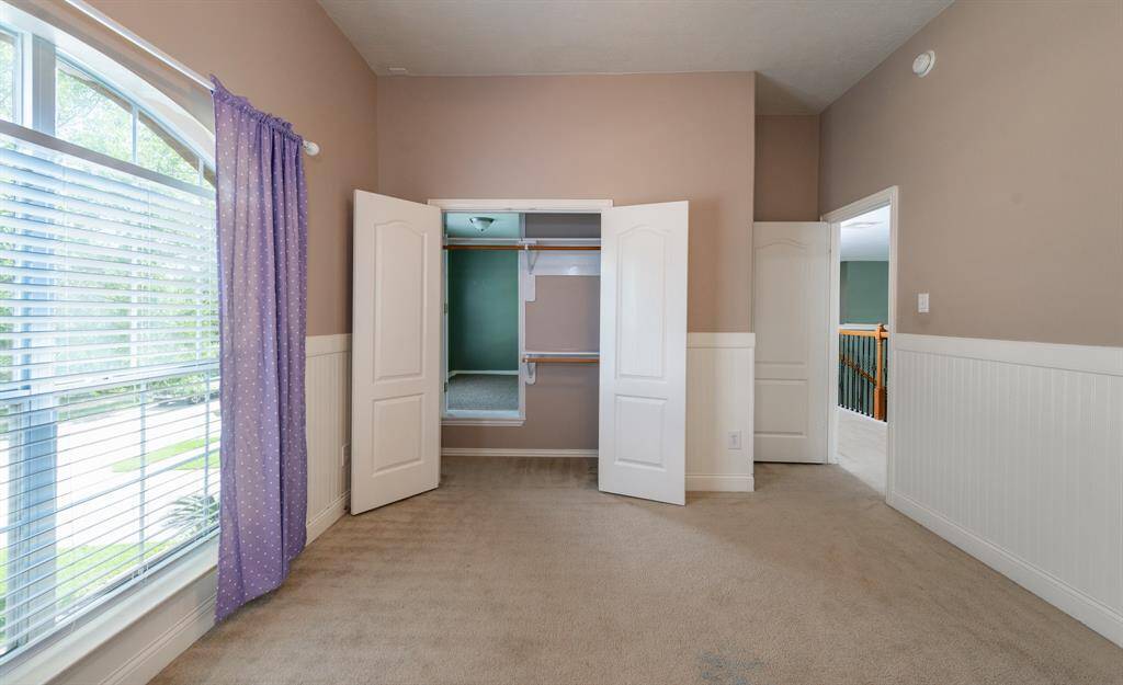 Discover the hidden room tucked inside the closet—perfect for a private retreat or creative workspace!
