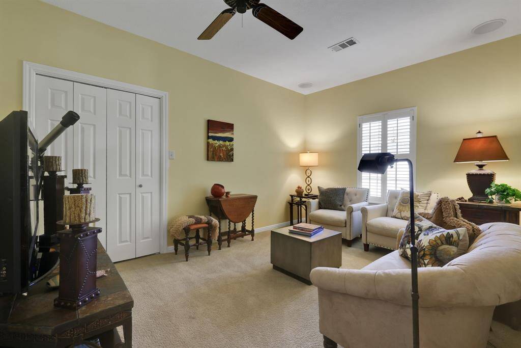 Guest bedroom 2 - currently used as a media room and features surround sound