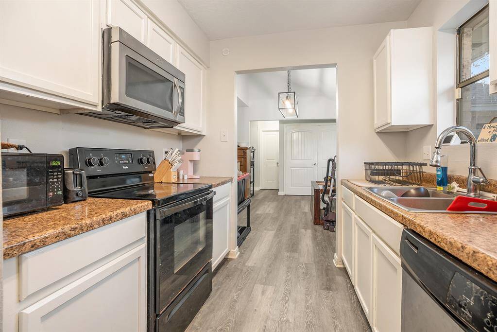 Another view of the Gourmet Kitchen and space it has to offer for the chef in you!