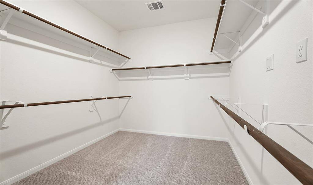 Owner's suite closet (*Photo not of actual home and used for illustration purposes only.)
