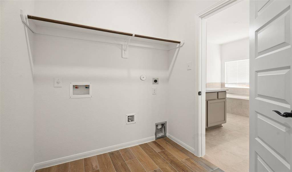 Laundry room (*Photo not of actual home and used for illustration purposes only.)