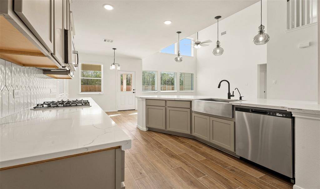 Kitchen open to great room (*Photo not of actual home and used for illustration purposes only.)