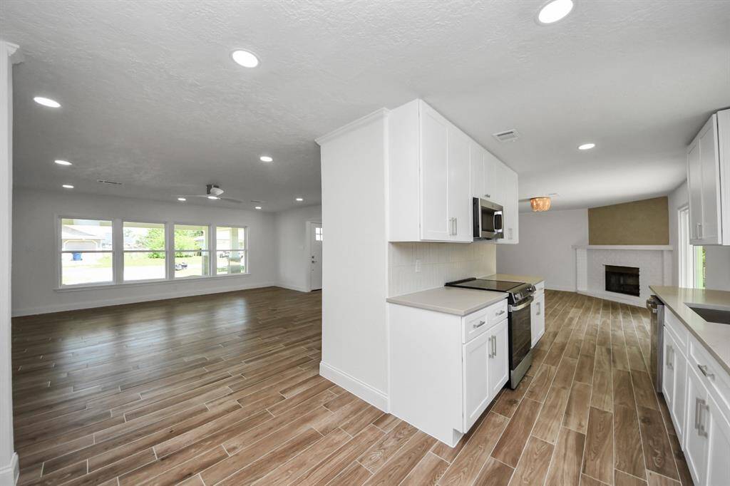 Open Concept flow from kitchen to family room.