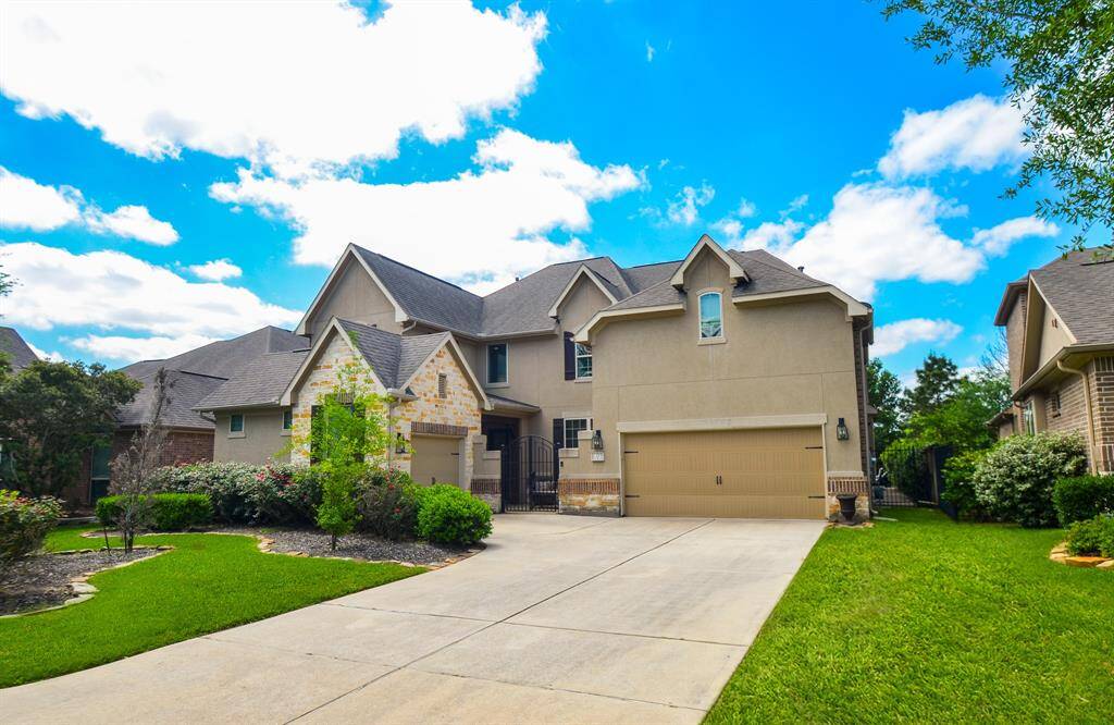 Comfortably pull into the pristine driveway, under attached garages. Inside this exquisite home, are 5 bedrooms and 4 full bathrooms, gracing an 8,947 square-foot lot with 4,171 square-feet of interior living space.