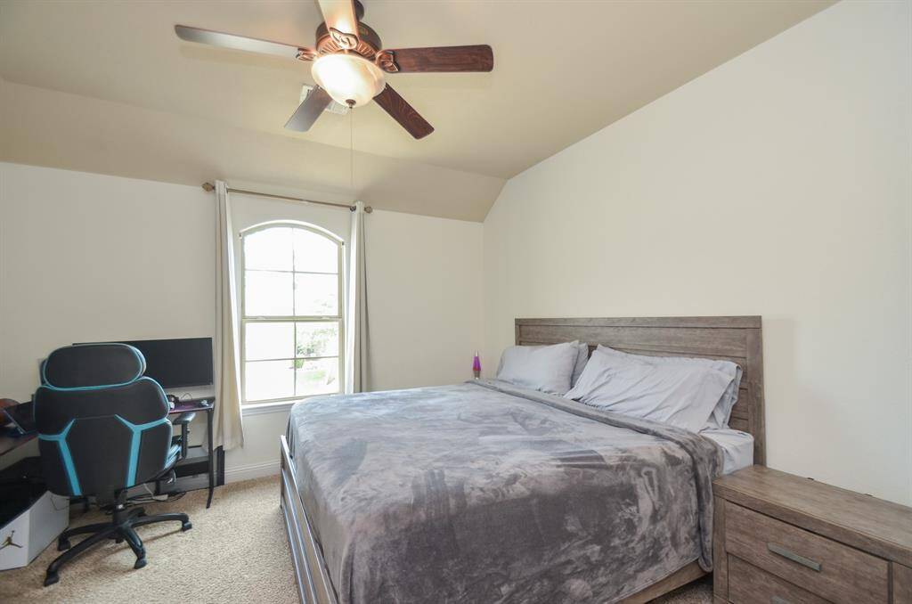 Great natural light bathes this large secondary bedroom in pure sunshine.
