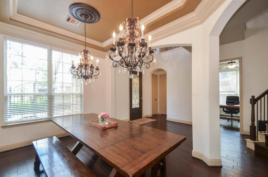 Simplicity equals gentle elegance here; but choose your lifestyle theme and imprint it throughout this special home! Right off the main entry/hallway, are two fabulous front rooms, for formal dining (and across the hall, in this view, a traditional home office).