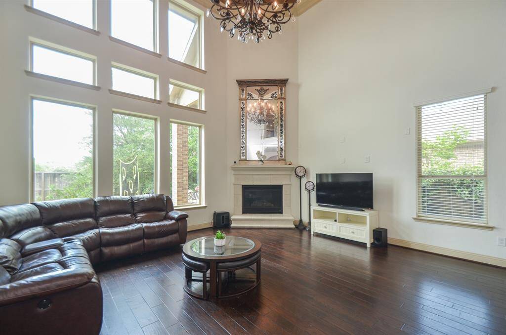 Expect guests to be absolutely quiet or full of admiring comments when they enter the showplace of your home, this magnificent living/family space.