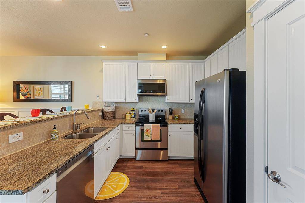 From ample cabinet storage to modern appliances, this fully furnished kitchen is ready for weekend getaways or full-time coastal living.