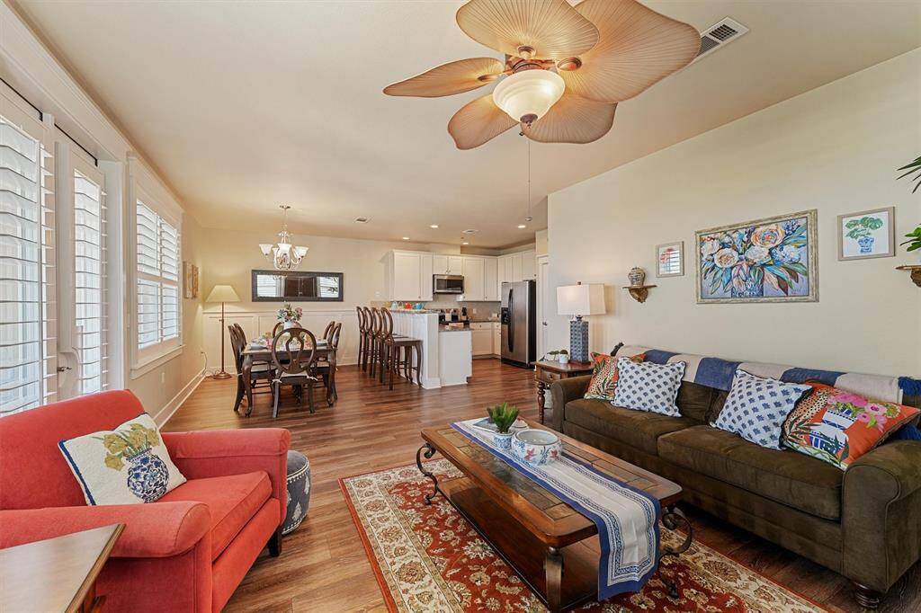 Enjoy effortless entertaining with the open layout connecting the living room to the dining area and kitchen—all in one beautifully appointed space.