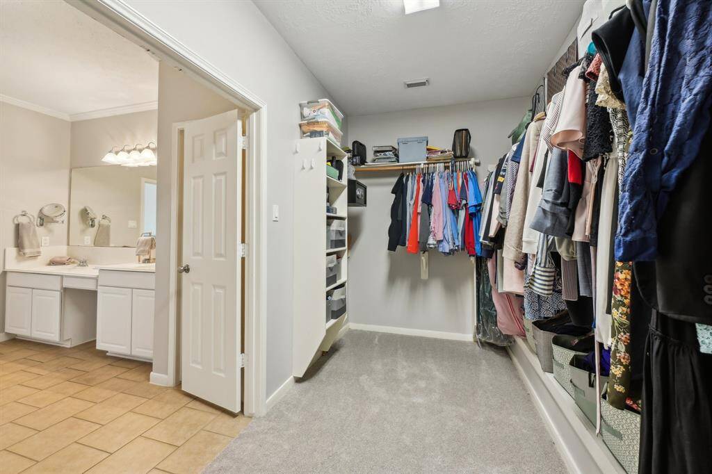Walk-in primary closet - with built in safe