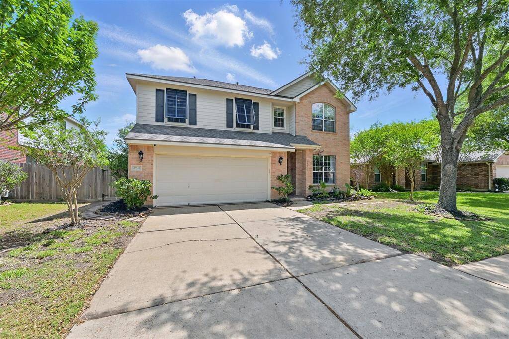 Spacious double-wide driveway offering plenty of parking space.