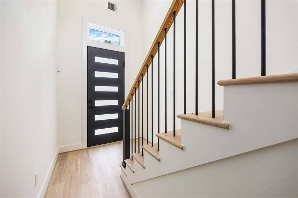 Step inside the home and be captivated by the beautiful manufactured wood flooring that runs throughout most of the home. There is a secondary bedroom with en-suite located on this floor, ideal as a study, a workout room, or a guest suite.