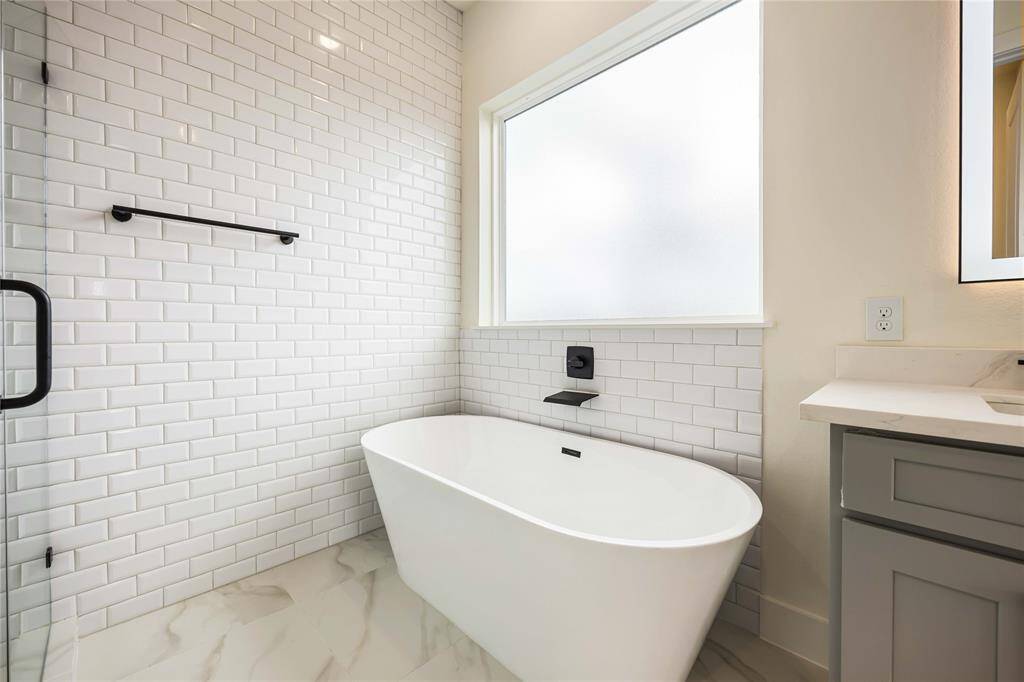 Relax at the end of a long day in this beautiful soaking tub.