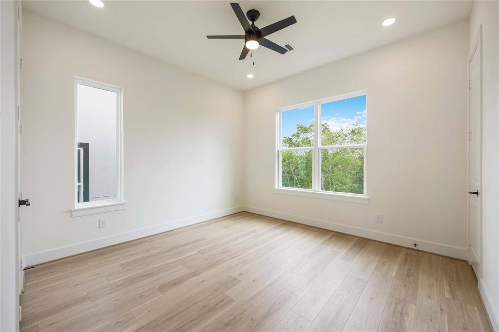 Bedroom 3, also an en-suite, is located on the third floor as well. High ceilings and large windows for the win!