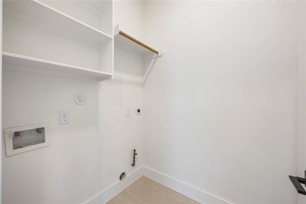 A large utility room is located on the 3rd floor for added convenience.