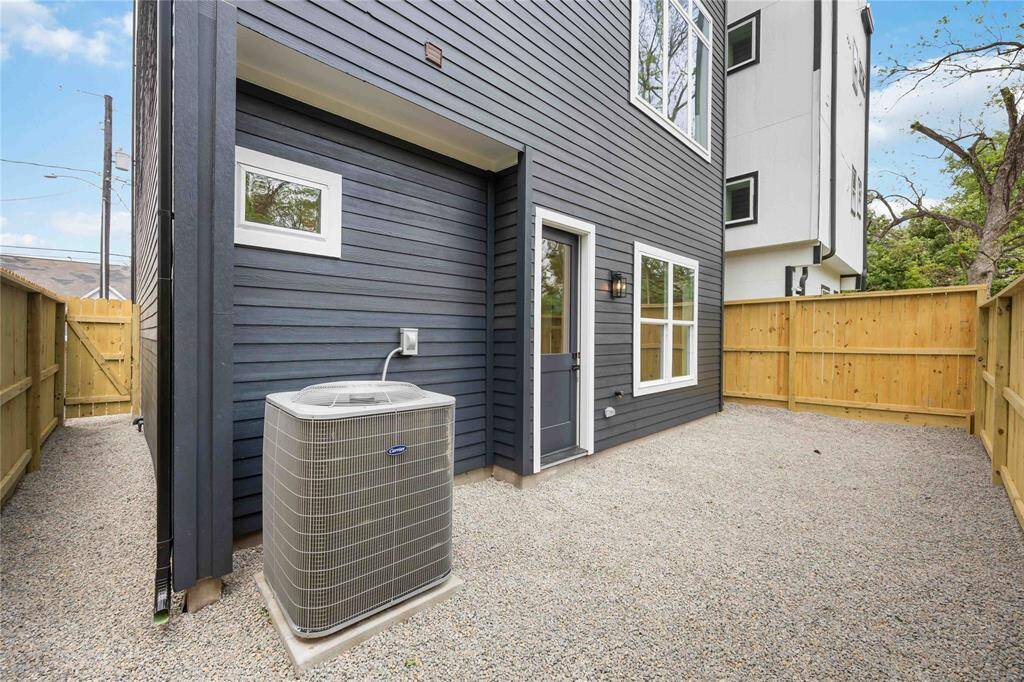 Add some outdoor seating and maybe a grill to this fully xeriscaped backyard. No grass, means very little maintenance!