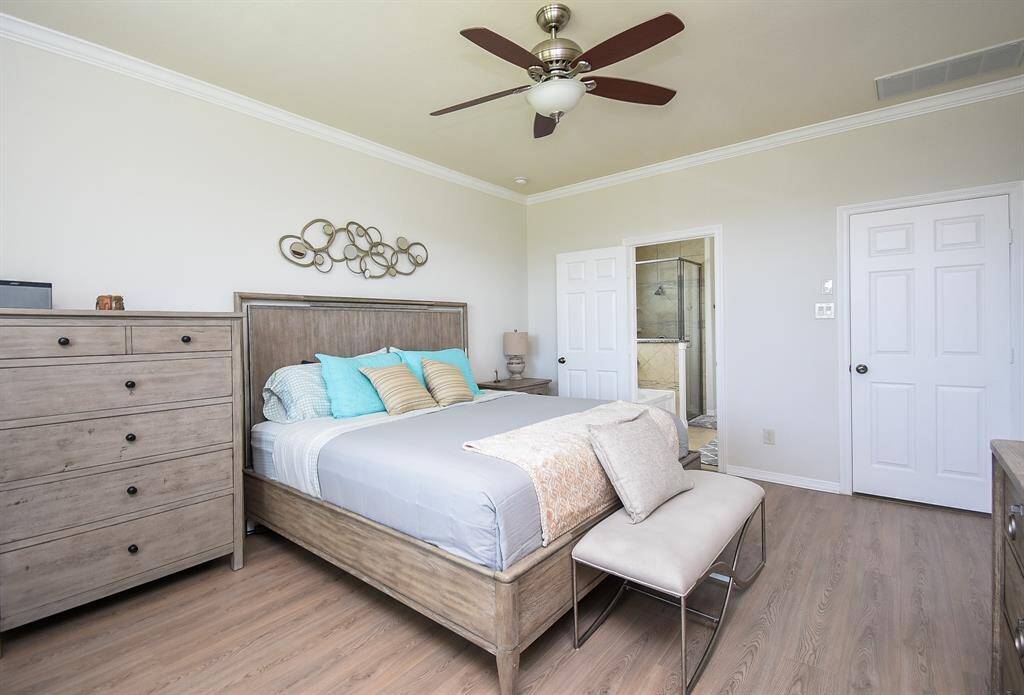 Your primary ensuite bath peeks out, up center.