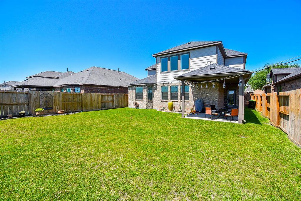 Your entire back property provides privacy fencing; and the covered patio may just become your morning coffee retreat.