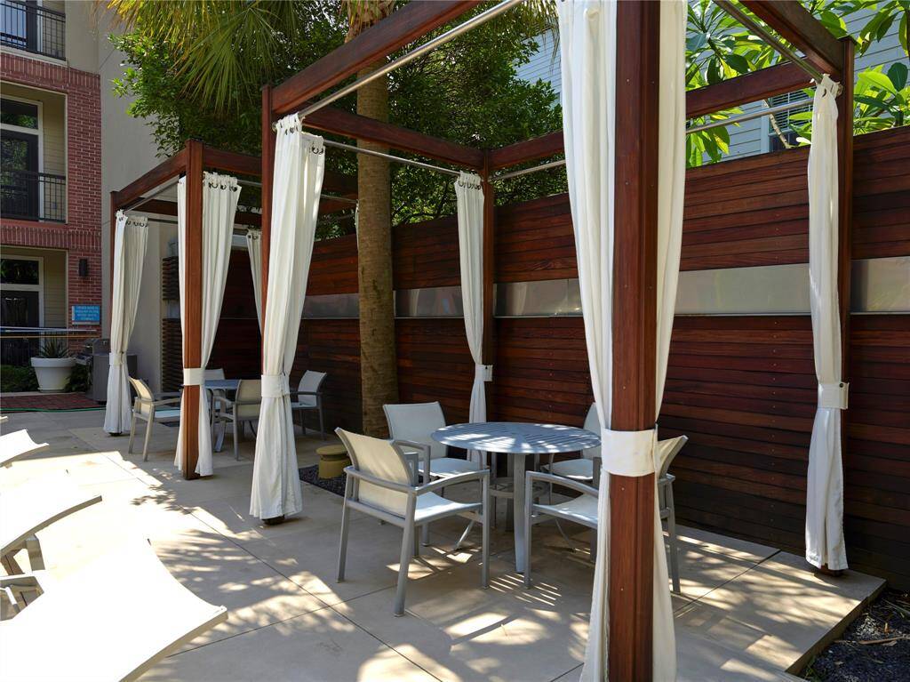 Pool cabana's, another area with gas grill and seating.