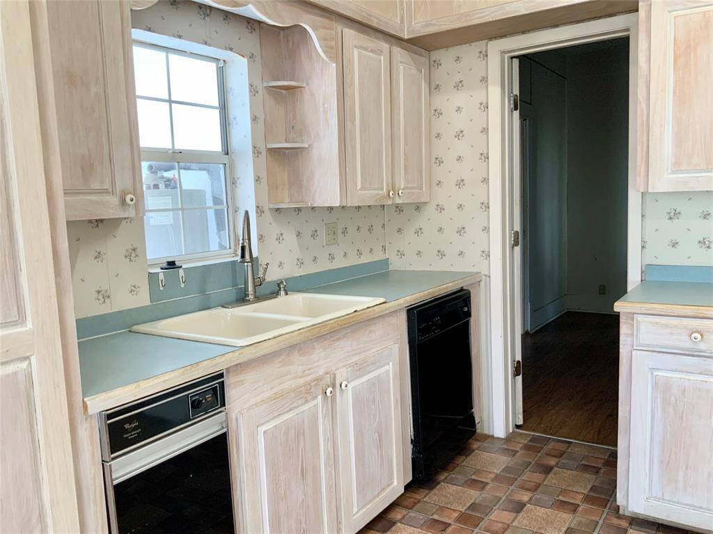 Family room looking towards dining and kitchen area