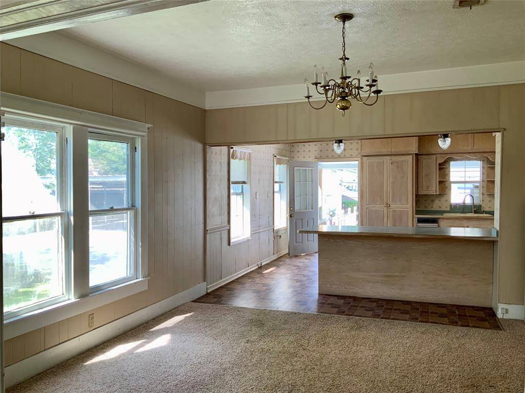 Family room looking towards dining and kitchen area