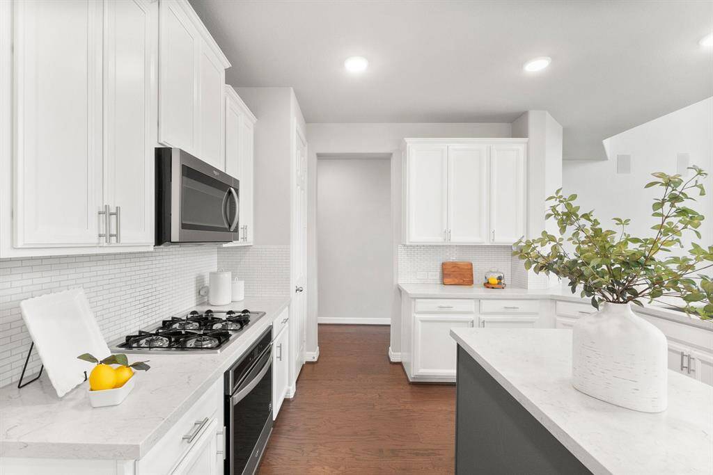 Kitchen features an abundance of storage space