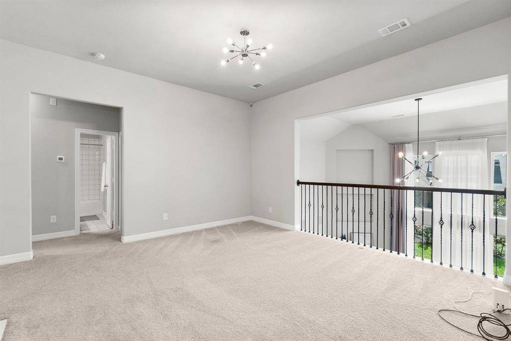Game room anchors the upstairs and provides a wonderful, additional living area