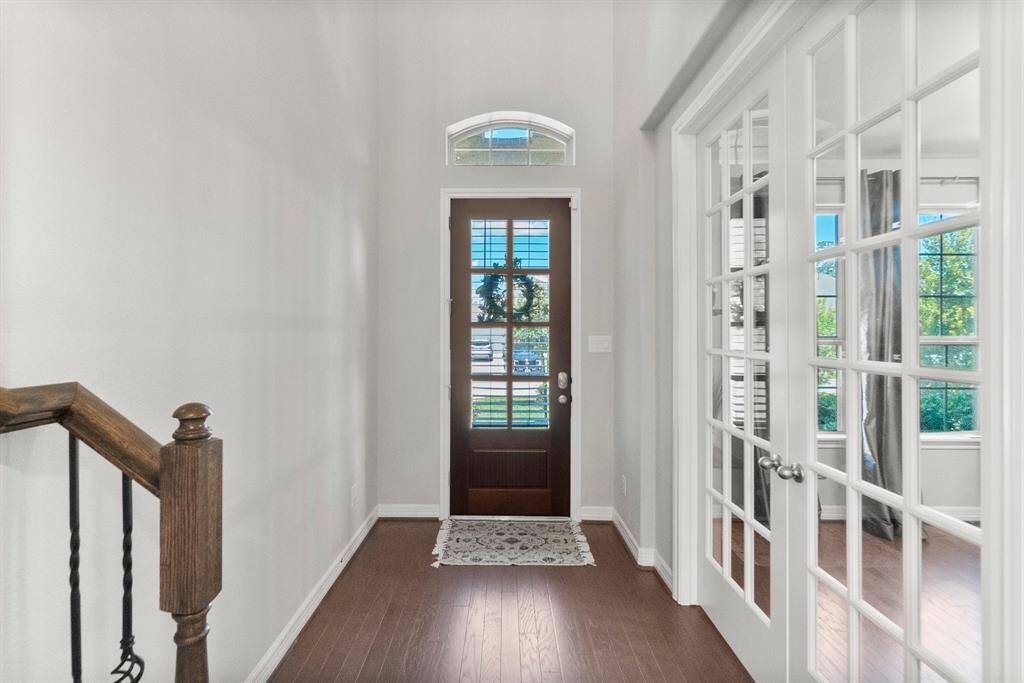 A separate office space is located just inside the front door