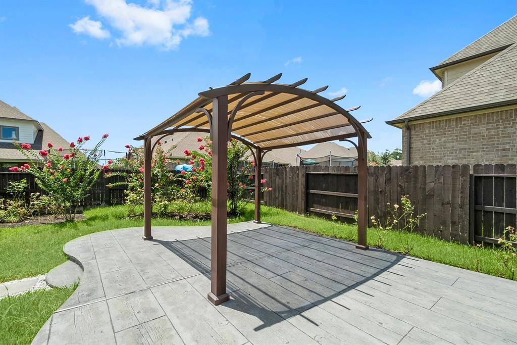 A shaded pergola is perfect for a lounge or outdoor dining space