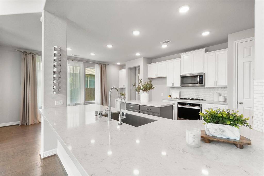 Plenty of counter and serving space in the beautiful kitchen