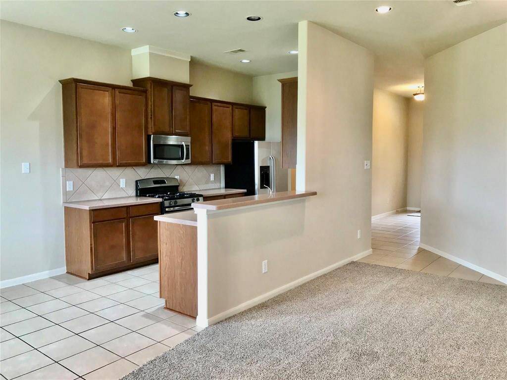 Kitchen open to family room.