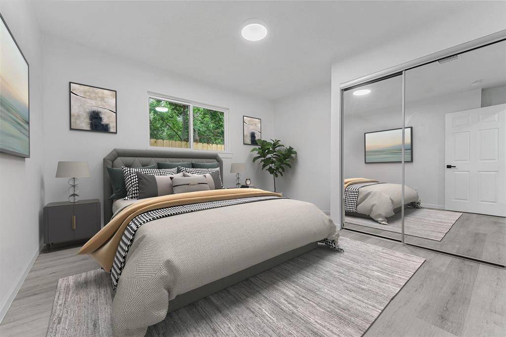 one of the 2 other bedrooms this home offers- Virtually staged for for you to see the beautiful potential .