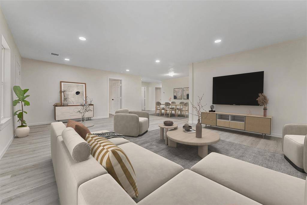 a beautiful view of the spacious family room (virtual staging)
