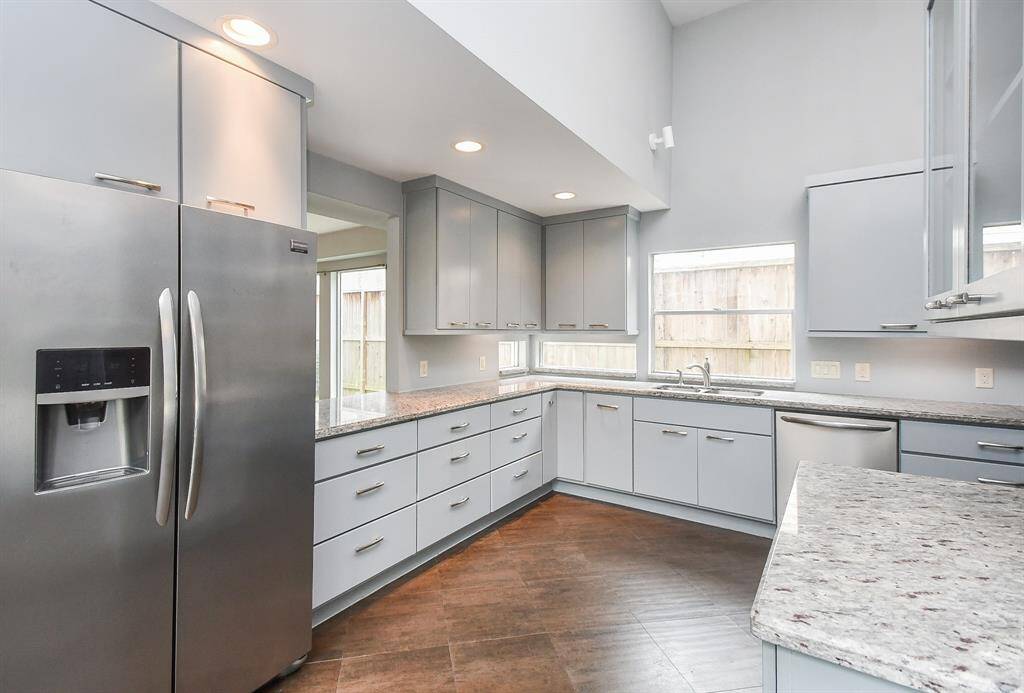 Beautifully renovated kitchen. The fridge stays with the home.
