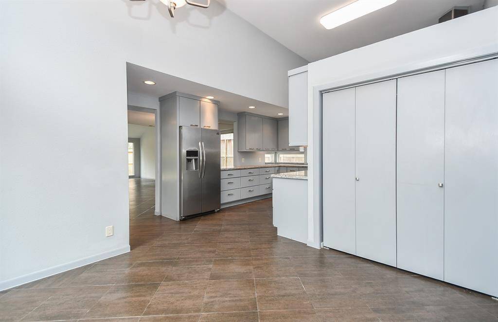 View from the breakfast room towards the kitchen. The utility room is through those doors.