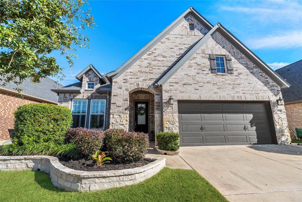 Welcome home to 2918 Muhley Street in the highly acclaimed Cane Island community in Katy!