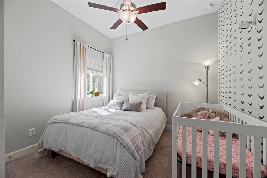 This delightful third bedroom is truly a canvas for your personal touch, ensuring it meets all your needs with style and ease.