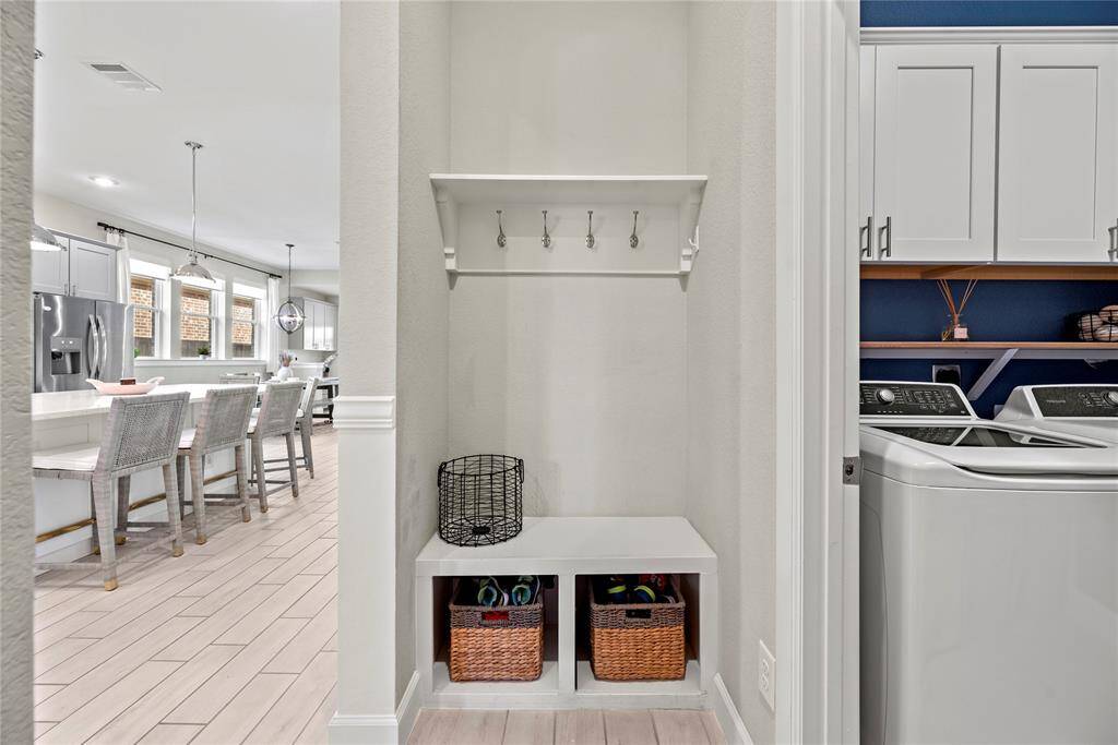 This well-appointed space includes ample storage and efficient organization, making laundry day a breeze while keeping your home tidy and functional.