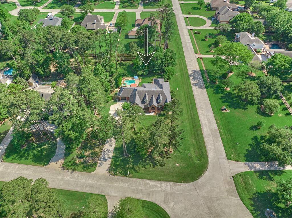 This stunning property spans more than three-quarters of an acre and is conveniently located near all the amenities of Tomball.