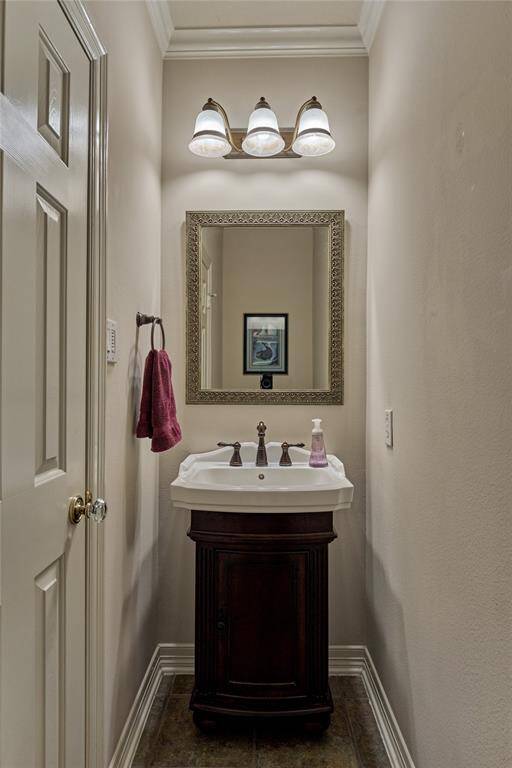 The half guest bathroom is the hallway and away from the main living area.