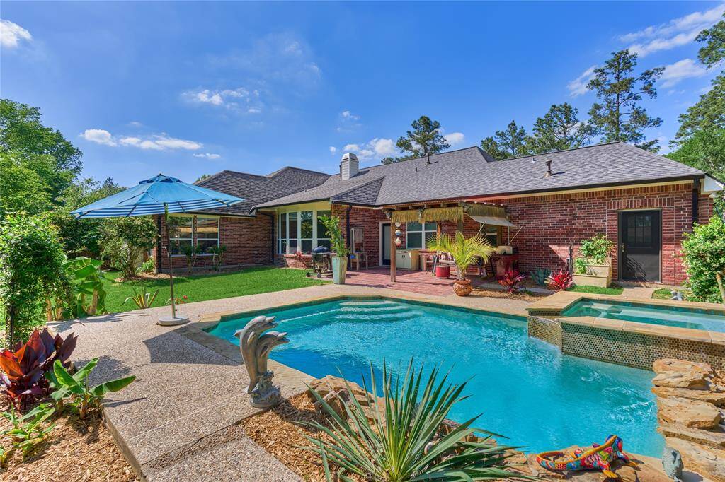 There is a convenient screened door to the secondary single car garage.