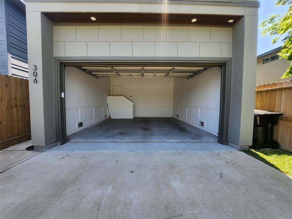 Garage has room for a large truck on the right side