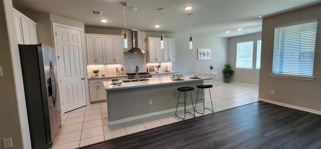 A Chef's Dream Come True! Commercial 6 Burner Gas Range and Stainless Vent are the Center of this Stunner!